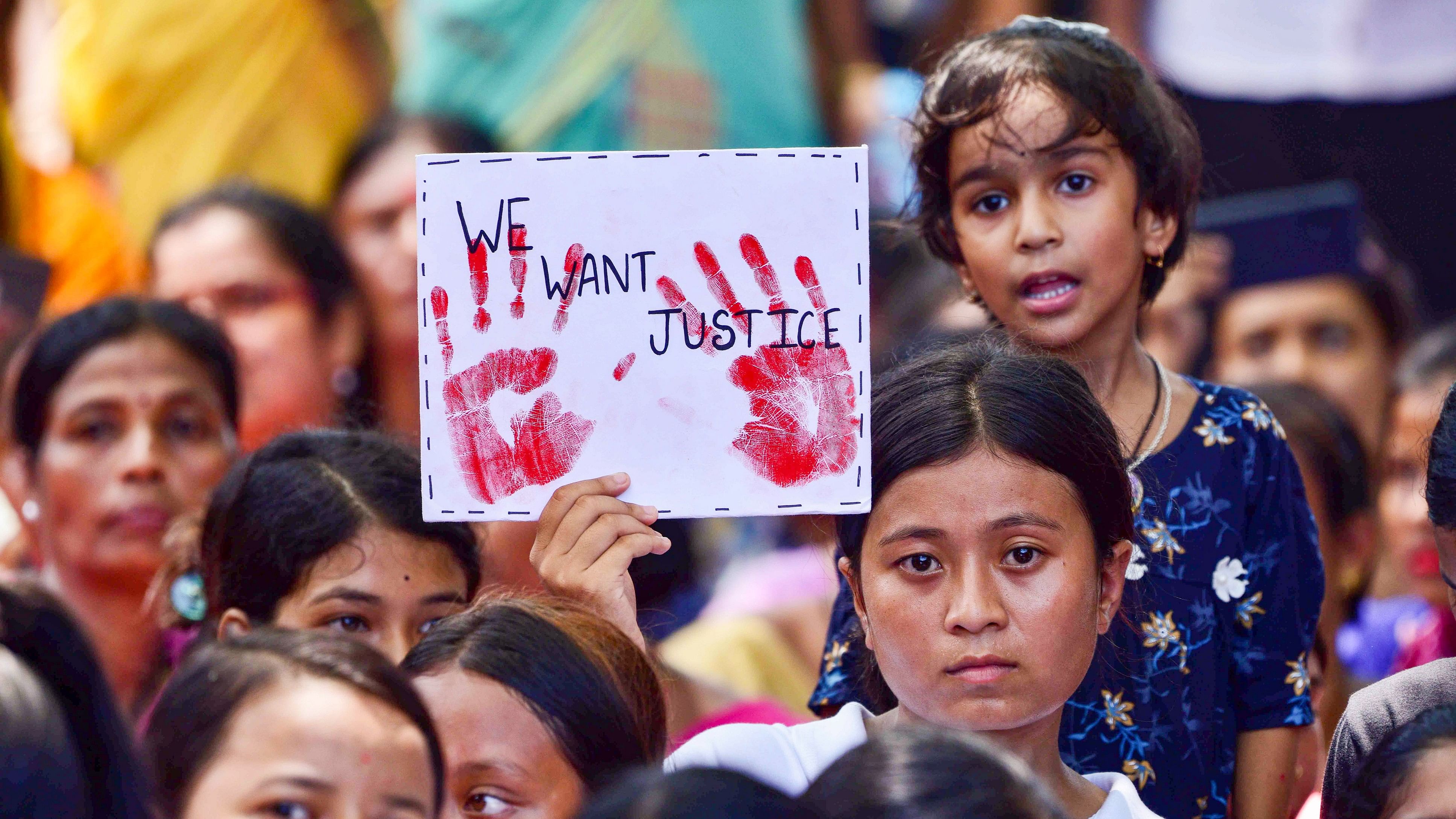 <div class="paragraphs"><p>Representative image showing a protest demanding justice against crimes on women.</p></div>